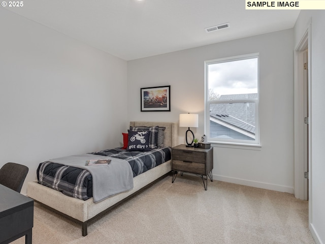 239 NW 29th Way, Battle Ground, WA 98604 - bedroom featuring visible vents, baseboards, and light carpet
