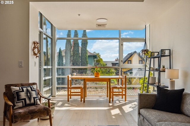 sunroom featuring visible vents