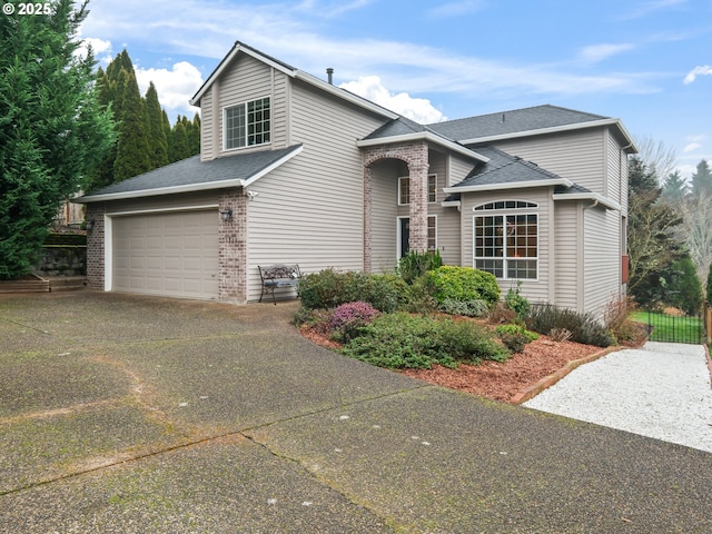 view of front of property with a garage