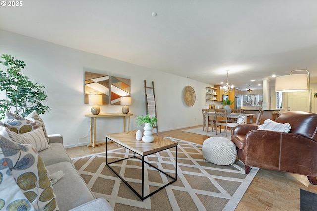 6708 N Richmond Ave, Portland, OR 97203 - living area with baseboards, recessed lighting, and a notable chandelier