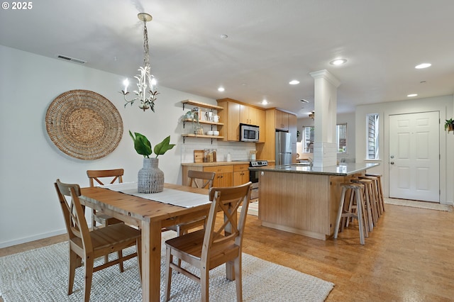 6708 N Richmond Ave, Portland, OR 97203 - dining room featuring recessed lighting, baseboards, visible vents, and an inviting chandelier