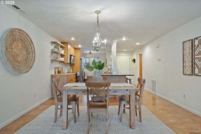6708 N Richmond Ave, Portland, OR 97203 - dining area with baseboards, recessed lighting, a chandelier, and visible vents