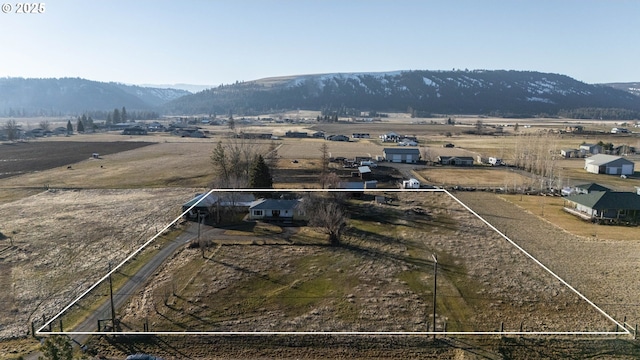 aerial view with a rural view and a mountain view