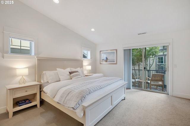 bedroom with light colored carpet, lofted ceiling, access to exterior, and multiple windows