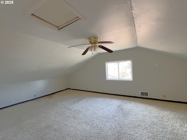 1042 Fir Ave, Reedsport, OR 97467 - additional living space featuring carpet, vaulted ceiling, and ceiling fan