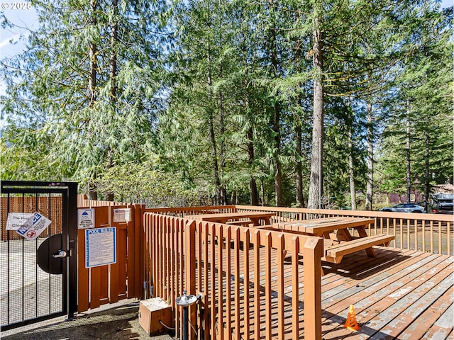 22260 E Wild Fern Ln, Brightwood, OR 97011 - wooden terrace with view of scattered trees
