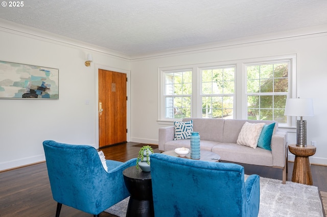 7327 N Washburne Ave, Portland, OR 97217 - living area with dark wood-style flooring, baseboards, and a textured ceiling