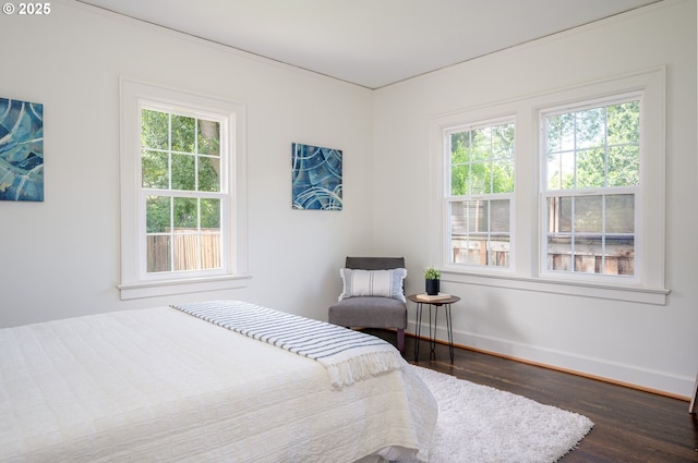 7327 N Washburne Ave, Portland, OR 97217 - bedroom featuring dark wood-style floors, multiple windows, and baseboards