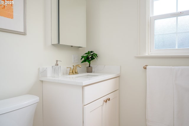7327 N Washburne Ave, Portland, OR 97217 - half bathroom with toilet and vanity