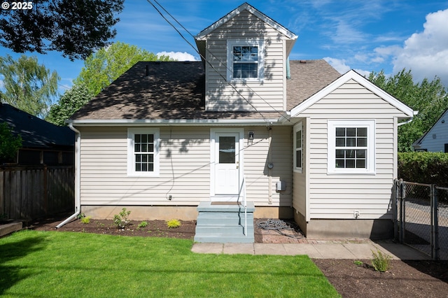 7327 N Washburne Ave, Portland, OR 97217 - back of property with a shingled roof, a gate, and entry steps