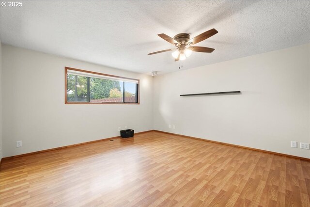 4603 SE 16th Ct, Gresham, OR 97080 - spare room featuring light wood finished floors, a ceiling fan, and a textured ceiling
