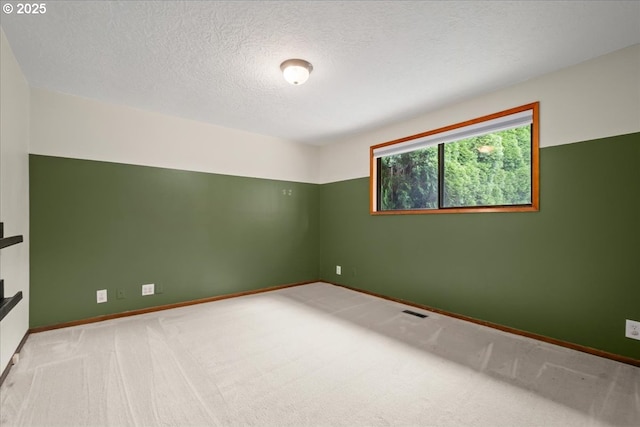 4603 SE 16th Ct, Gresham, OR 97080 - empty room with carpet floors and a textured ceiling