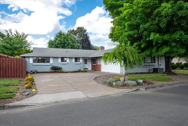 4603 SE 16th Ct, Gresham, OR 97080 - ranch-style house featuring concrete driveway, a garage, and a chimney