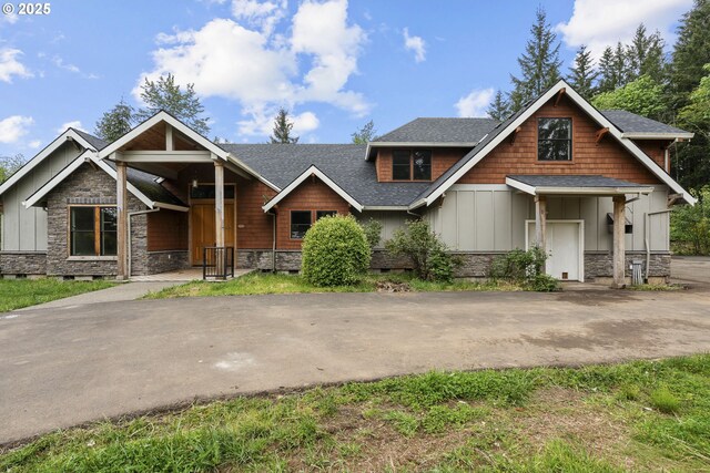 39665 SE Rude Rd, Sandy, OR 97055 - view of front of house with board and batten siding, stone siding, and a shingled roof