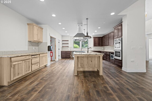39665 SE Rude Rd, Sandy, OR 97055 - kitchen featuring stainless steel double oven, decorative backsplash, dark wood-style flooring, and recessed lighting