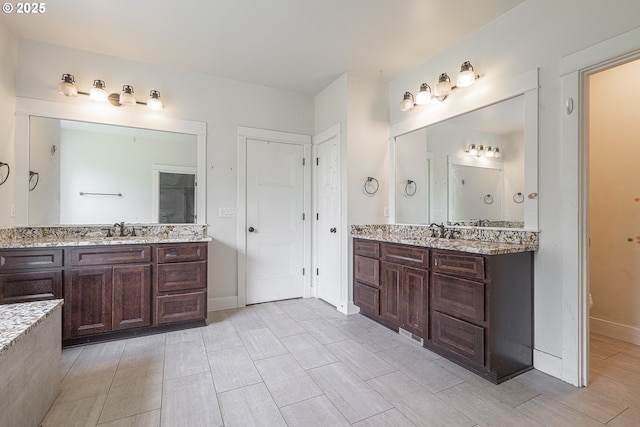39665 SE Rude Rd, Sandy, OR 97055 - bathroom with two vanities and baseboards