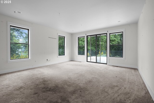 39665 SE Rude Rd, Sandy, OR 97055 - carpeted spare room with plenty of natural light and baseboards