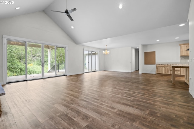 39665 SE Rude Rd, Sandy, OR 97055 - unfurnished living room featuring high vaulted ceiling, a chandelier, a ceiling fan, dark wood-style floors, and recessed lighting