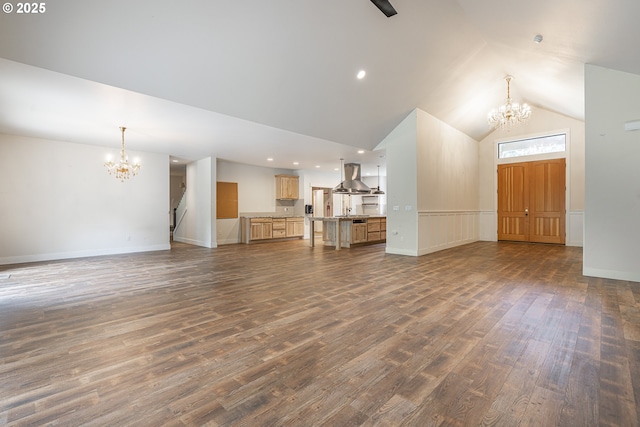 39665 SE Rude Rd, Sandy, OR 97055 - unfurnished living room featuring a chandelier, dark wood-type flooring, wainscoting, baseboards, and recessed lighting