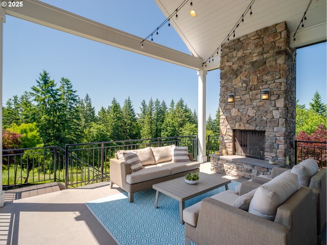 13848 SE Diamond Ridge Rd, Happy Valley, OR 97086 - view of patio featuring an outdoor living space with a fireplace