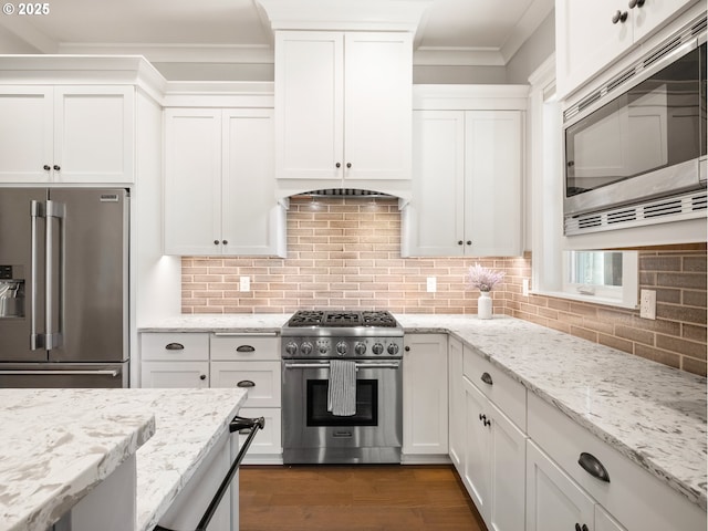 13848 SE Diamond Ridge Rd, Happy Valley, OR 97086 - kitchen with high end appliances, ornamental molding, and white cabinets