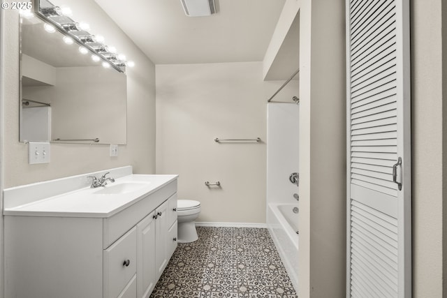 bathroom featuring toilet, shower / bathtub combination, baseboards, and vanity
