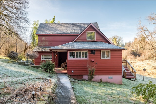 502 Gp Erickson Rd, Clatskanie, OR 97016 - view of front facade featuring a front lawn, a deck, a shingled roof, and crawl space