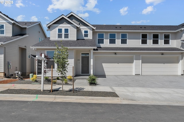 195 SE Acacia Dr, Gresham, OR 97080 - multi unit property with driveway, an attached garage, and roof with shingles