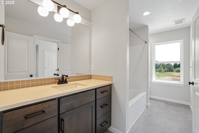 195 SE Acacia Dr, Gresham, OR 97080 - bathroom featuring vanity and washtub / shower combination
