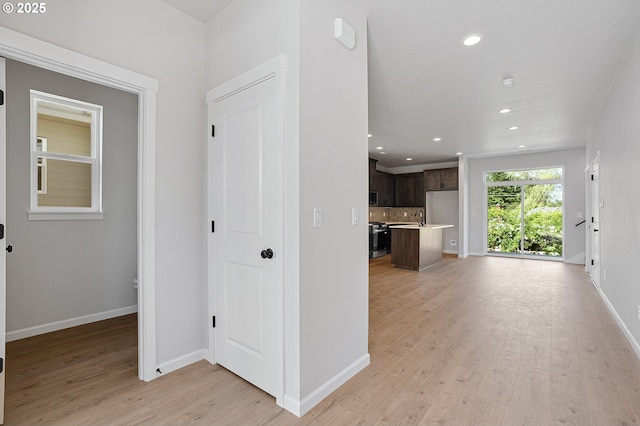 195 SE Acacia Dr, Gresham, OR 97080 - hall featuring light wood-style flooring and recessed lighting