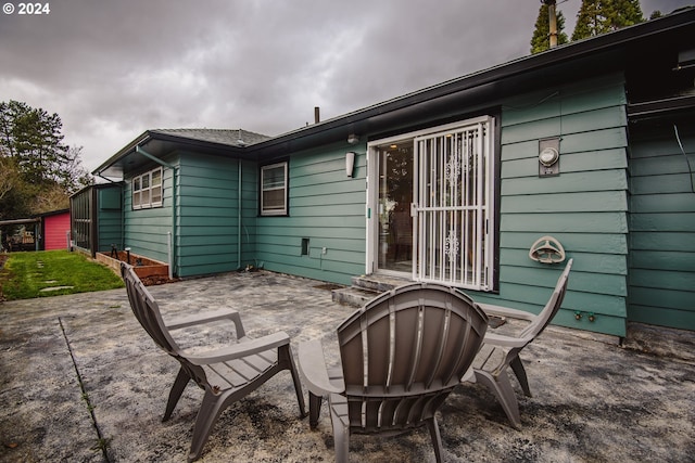 back of house featuring a patio