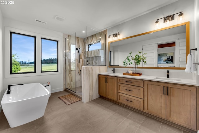 3800 W 2nd St, Washougal, WA 98671 - bathroom featuring a marble finish shower, double vanity, and a freestanding bath
