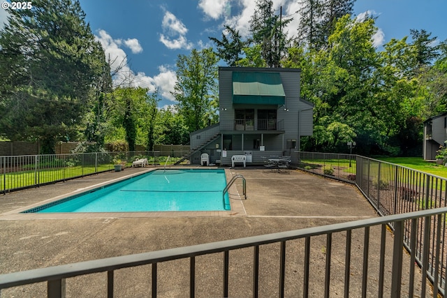 6745 SW Scholls Ferry Rd Unit 10, Beaverton, OR 97008 - community pool featuring a patio area, stairway, and view of scattered trees