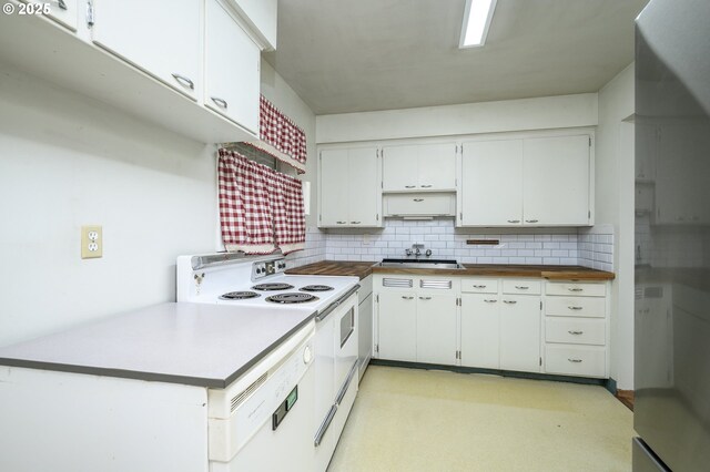 140 Canemah Rd, Oregon City, OR 97045 - kitchen featuring white electric range oven, a sink, backsplash, and white cabinetry