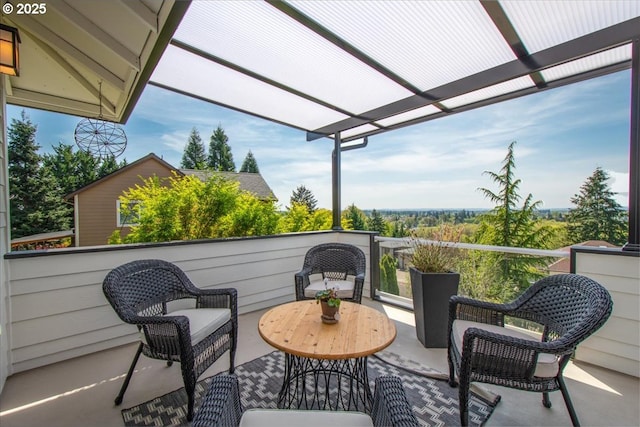 view of patio / terrace with a balcony