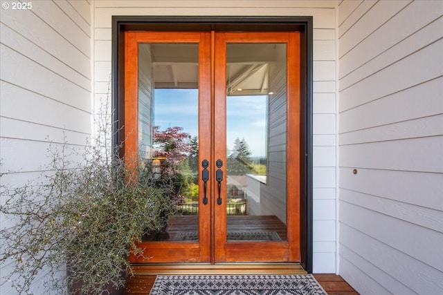 entrance to property featuring french doors