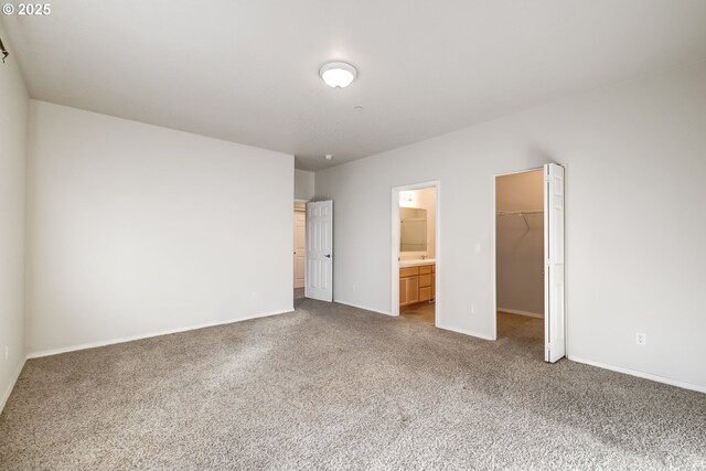 full bathroom featuring a stall shower, visible vents, a sink, and double vanity