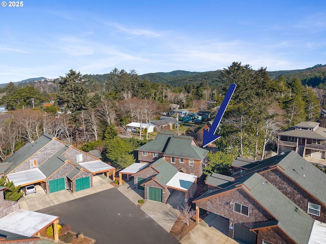 bird's eye view featuring a residential view and a mountain view