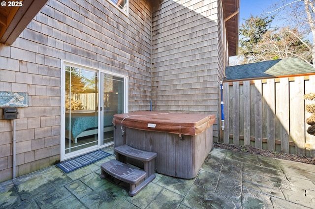 view of patio with a hot tub