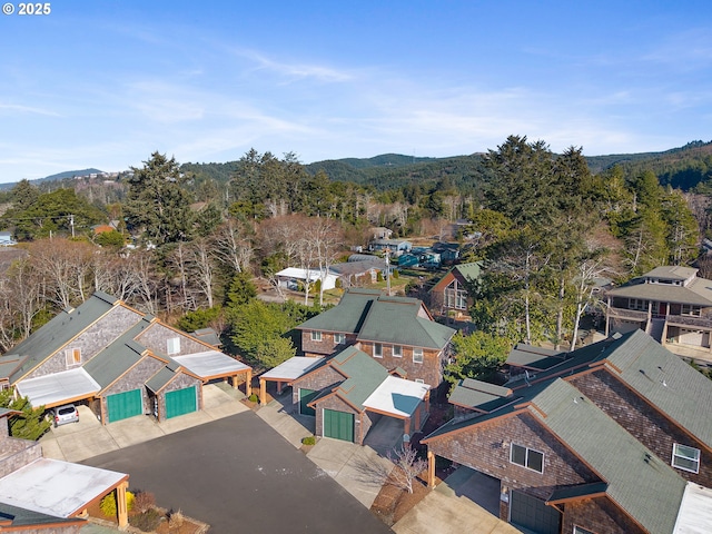 bird's eye view featuring a mountain view and a residential view