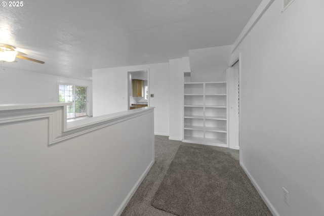 276 S 21st St, Reedsport, OR 97467 - spacious closet with dark colored carpet and ceiling fan