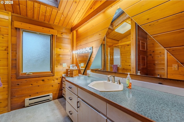 bathroom with wood ceiling, vanity, wooden walls, and vaulted ceiling with skylight