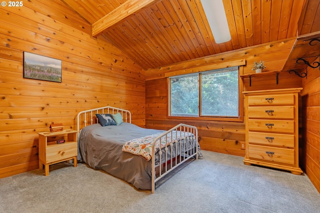 carpeted bedroom featuring vaulted ceiling with beams, wood ceiling, and wooden walls