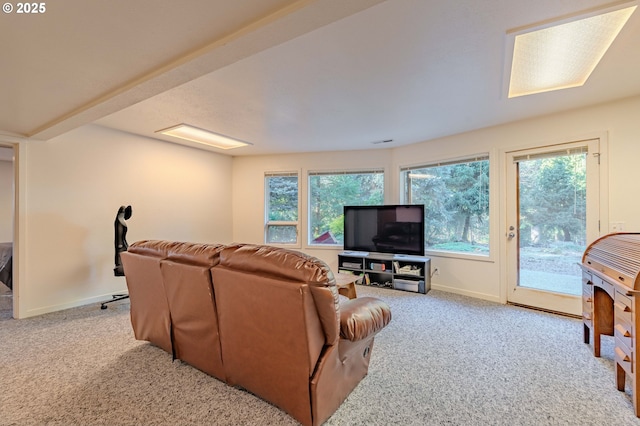 living room featuring light colored carpet