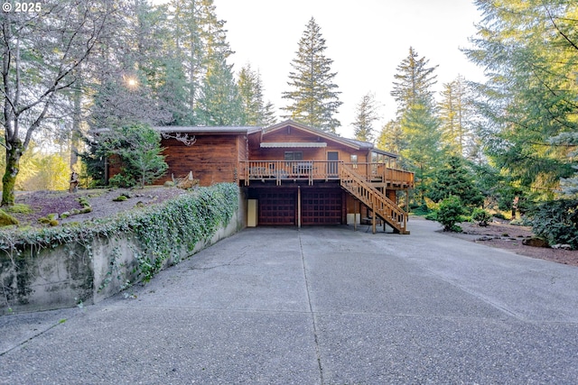 cabin with a wooden deck