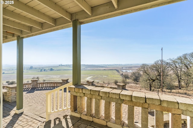 view of patio with a rural view