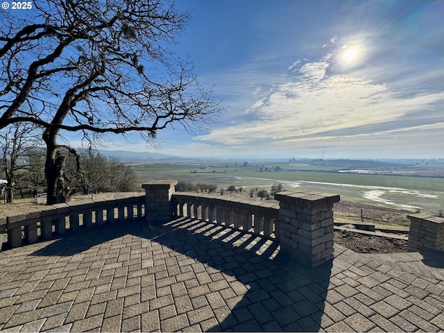 view of patio featuring a water view