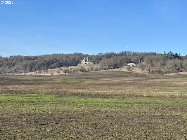 exterior space with a rural view