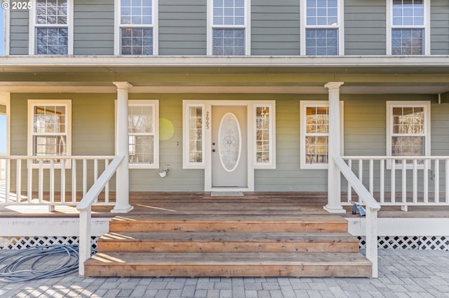 entrance to property with covered porch