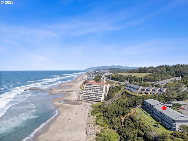 4229 SW Beach Ave Unit 27, Lincoln City, OR 97367 - drone / aerial view with a water view and a view of the beach